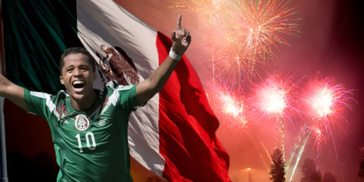 Giovani Dos Santos junto a la bandera de México / FOTO MEXSPORT
