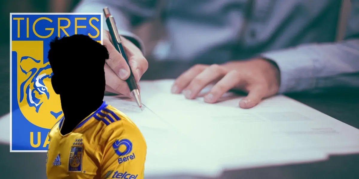 Jugador incógnito de Tigres junto a firma de contrato / FOTO Getty Images